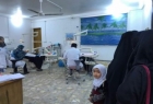 ​فريق طبي ايراني يقدم خدماته بالمجان لايتام النجف
