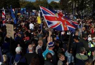 Britons rally against Brexit as deal voted down