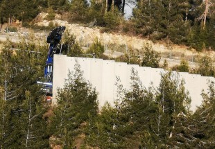 جيش الإحتلال يستكمل العمل ببناء الجدار في بلدة العديسة في جنوب لبنان