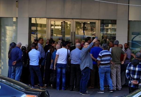 Lebanese banks reopen for first time in two weeks