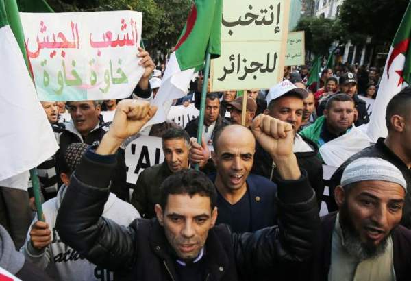 Pro-vote Algerians march against 