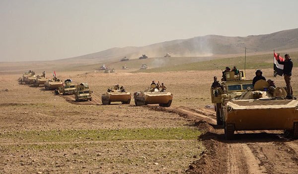 تعزيزات عسكرية كبيرة للحشد الشعبي العراقي تصل إلى الموصل لتأمين الحدود مع سوريا