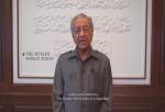 Malaysian ex-PM criticizes infighting, discrimination in Muslim world