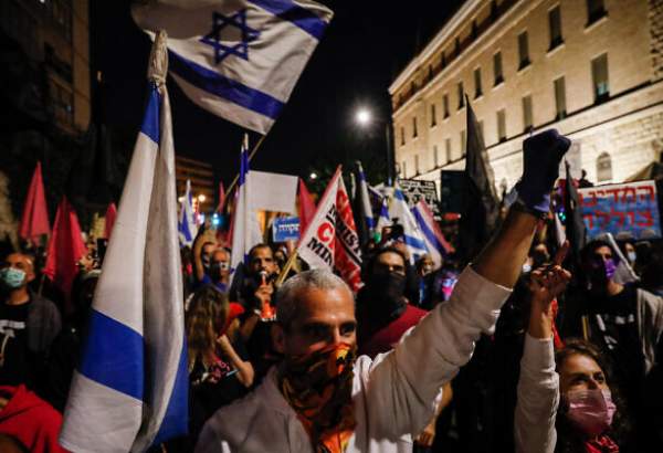 تظاهرات علیه نتانیاهو در فلسطین اشغالی با وجود شیوع کرونا و برودت هوا