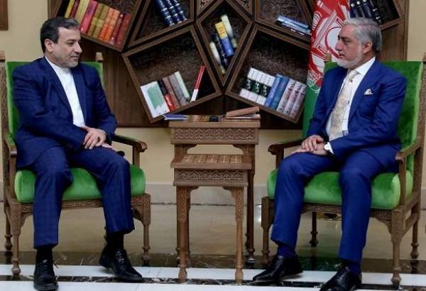 Deputy Iranian Foreign Minister Abbas Araqchi meets with head of the Afghan High Council for National Reconciliation, Abdullah Abdullah, in the Afghan capital Kabul on December 12, 2020.