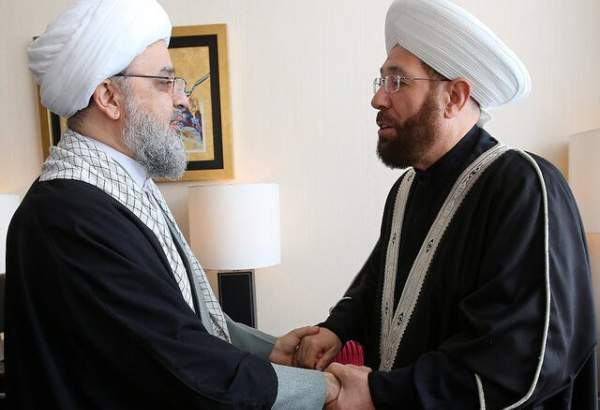 Hujjat-ul-Islam Hamid Shahriari, Secretary General of World Forum for Proximity of Islamic Schools of Thought (L) meeting with Sheikh Ahmad Badreddin Hassoun, top Syrian Mufti (R) in Tehran