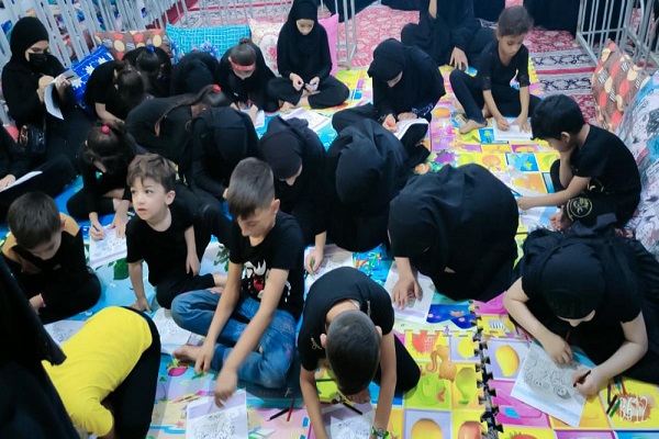 ایستگاه قرآنی ویژه کودکان در مسیر پیاده‌روی اربعین + عکس