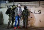 Occupation forces detain 11 Palestinians in West Bank
