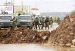 Israeli army blocks four roads linking the town of Hawwara, in the north of West Bank, to area towns