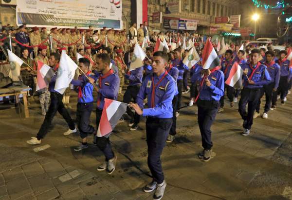 Yemeni scouts participate in an official parade marking the eighth anniversary of the Houthi takeover of Sanaa, Yemen, Sept. 20, 2022. - Mohammed Huwais/AFP via Getty Images
