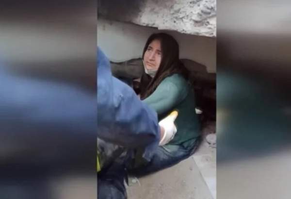 Turkish woman saved from quake calls for scarf first (video)  