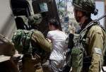 Israeli occupation forces detaining Palestinians in the occupied territories. (File)