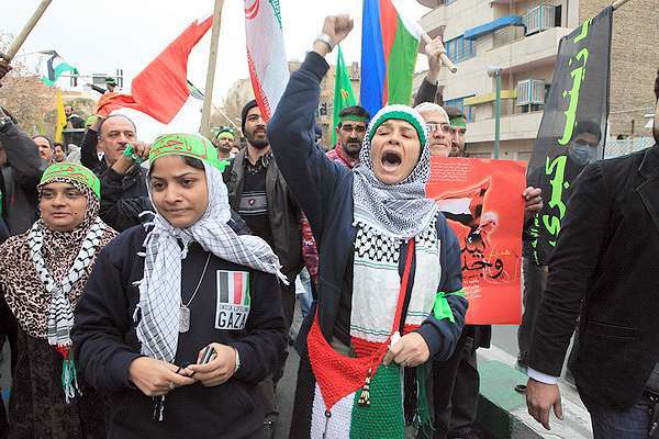 احمدي نجاد يحضر مراسم استقبال اعضاء قافلة الحرية بطهران
