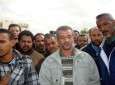 احتجاج سابق للذين اقتحمت مساكنهم أمام مصرف الادخار في بنغازي