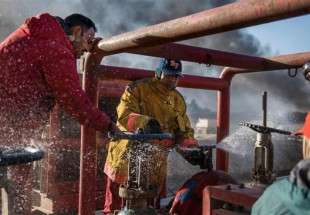 Firefighters fight Qayyarah oilfields amid flames
