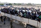 Migrants are transported to detention center in coastal city of Sabratha, Libya in October