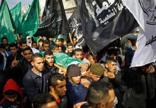 Palestinians hold funeral for teenage boy shot by Israeli forces on Gaza Strip