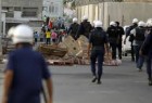 Bahraini regime forces raid houses across kingdom, detain many activists