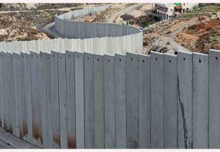 إسرائيل تختبئ خلف تسعة أمتار من الإسمنت
