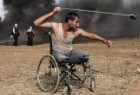 الصورة المؤثرة لمُقعد فلسطيني تفوز بجائزة دولية