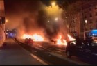 Cars ablaze outside France
