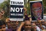 Indian protesters hold rally in the capital New Delhi ahead of the US President Donald Trump