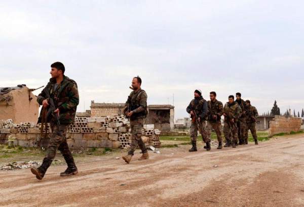 Syrian government forces patrolling the village of Tel-Toukan in Idlib