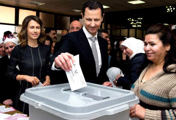 Syrians participate in parliamentary votes as battles wind down