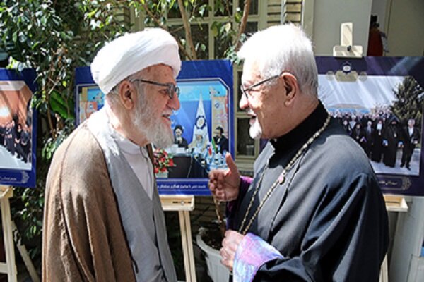 Late Ayatollah Mohammad Ali Taskhiri (L), advisor of the Supreme Leader in Muslim world affairs greeting Sepuh Sarkissian (R), Archbishop of Armenian Christians in Iran