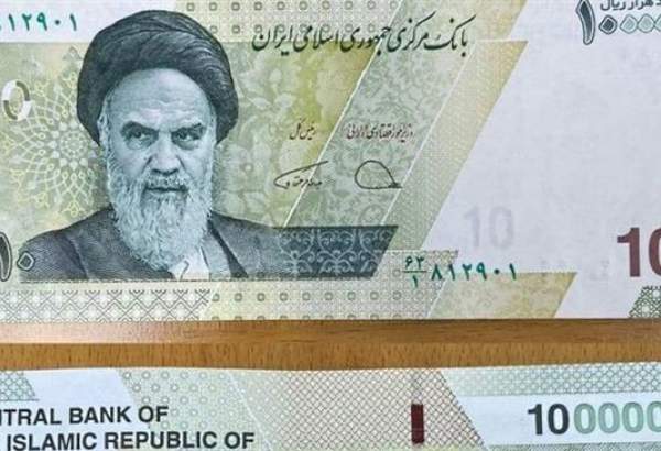 New Iranian note with pale zeros symbolizes transition to new currency