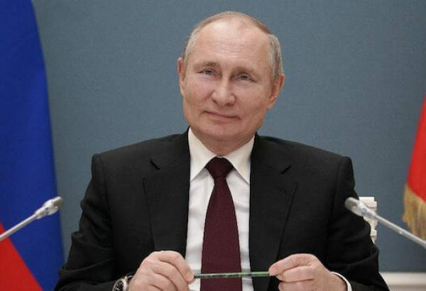 Putin signs bill allowing him 2 more presidential terms