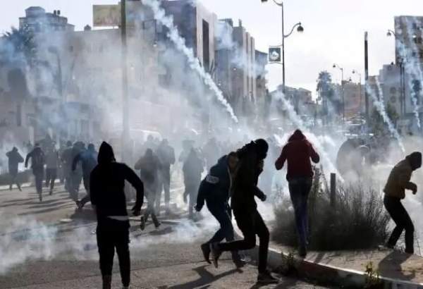 Dozens of Palestinian protesters injured in clash with Israeli forces