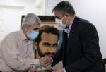 دیدار رئیس سازمان انرژی اتمی با خانواده شهید احمدی روشن