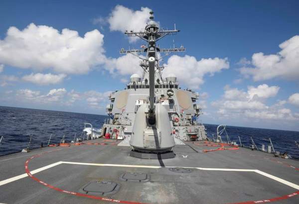Chinese military warns US warship illegally entering South China Sea
