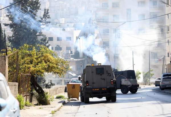 Israeli forces detain nine Palestinians, shoot two others in West Bank raids