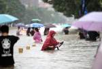 چین میں ڈوکسوری طوفان / موسلا دھار بارش کے بعد ہزاروں افراد گھر چھوڑ کر چلے گئے