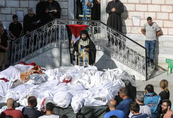 Funeral procession for victims of Israeli strike on Gaza church (video)