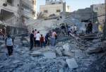 UN official in Gaza, dozens of relatives killed in Israeli strikes